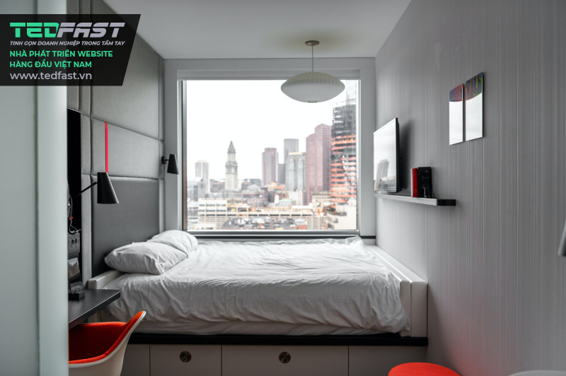 Hình ảnh Căn phòng ngủ đơn giản với Cửa sổ hướng Phố Hiện đại